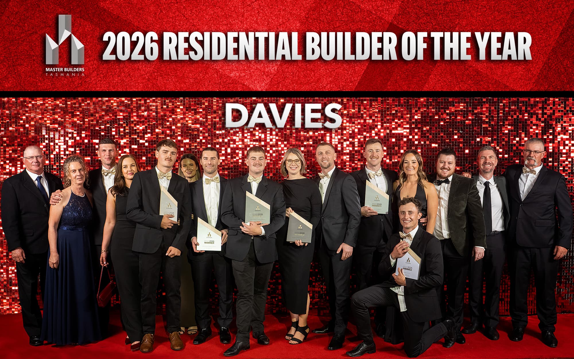 The Davies Design & Construction team with their awards after being named 2026 Residential Builder of the Year by Master Builders Tasmania