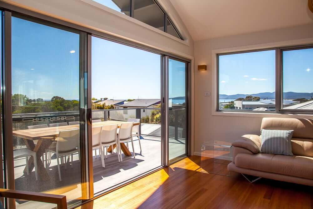 Wave House -curved ceiling and curved highlight window.