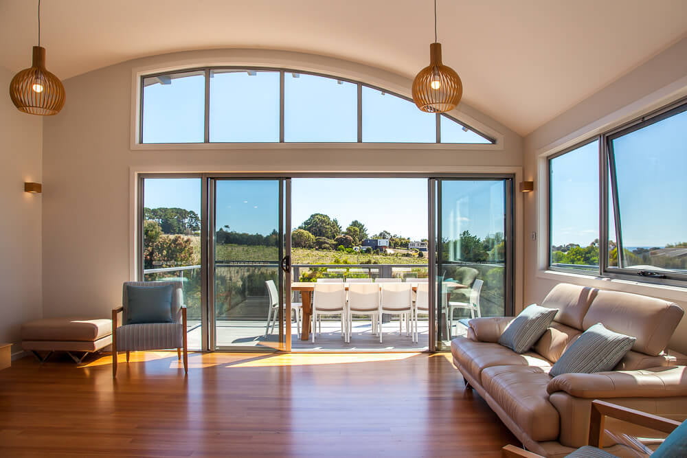 Wave House -curved plaster ceiling and curved highlight window.